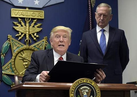 President Donald Trump, left, with Defence Secretary James Mattis. (File Photo | AP)
