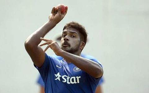 India's Varun Aaron bowls in the nets during a training session on the eve of the first Test match between India and South Africa at The Punjab Cricket Association Stadium in Mohali on November 4, 2015. | AFP