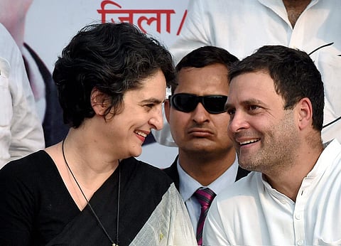 Congress Vice President Rahul Gandhi with sister Priyanka Gandhi Vadra at an election rally in Rae Bareli on Friday. | PTI File Photo