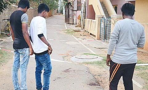 Boys take a look at the spot where 14-year-old Harsharaj was stabbed to death in Yelahanka on Monday | PUSHKAR V