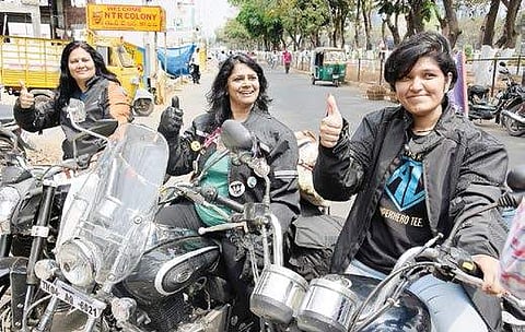 Three women riders on their way to Kolkata from Pondichury as part of ‘Be Bold for Change’ initiative in connection with the International Women’s Day, in  Vijayawada on Monday. They will reach Kolkata on March 7 and participate in the Women’s Day Celebra
