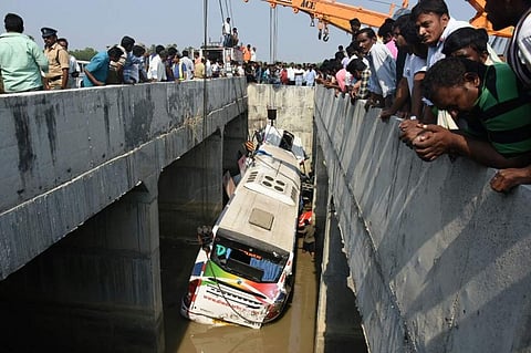 Eleven passengers were killed and at least 40 were wounded when a private bus fell off a flyover near Penuganchiprolu in Krishna district of Andhra Pradesh. (EPS | P Ravindra Babu)