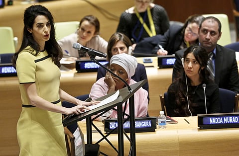 Amal Clooney, left, address a UNHR meeting called 'The Fight against Impunity for Atrocities: Bringing Da'esh to Justice,' (File Photo | AP)