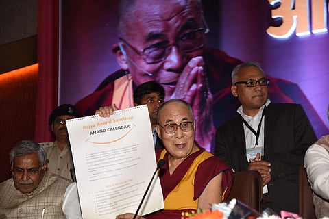 Dalai Lama releasing the Happiness Calendar and addressing the gathering at MP state Assembly in Bhopal on Sunday. (EPS)