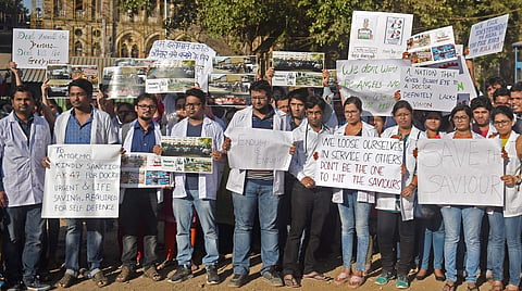 Resident doctors protest at the Azad Maidan demanding security after a intern was assaulted by patient's relatives in Mumbai. (File | PTI)
