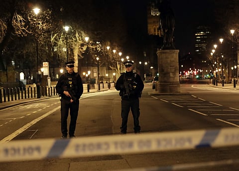 Two policemen stand guard at a cordoned off area on the way to the Houses of Parliament in central London, Wednesday, March 22, 2017. Police said they were treating the attack as terrorism. (Photo | AP)