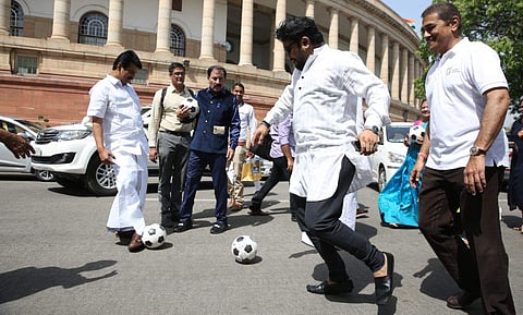 Prasun Banerjee and other MP's play football outside the parliament in New Delhi. (Photo :  Shekhar Yadav | EPS)