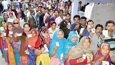 Voters queue up at a UP poll booth