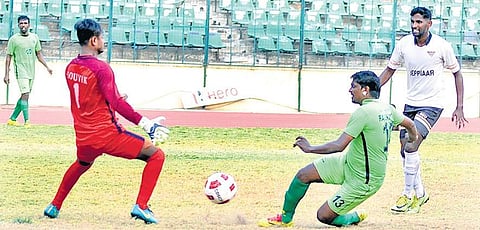 Action from the match between Madras Sporting Union and Southern Railway;  | D SAMPATHKUMAR