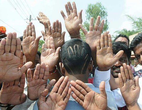Congress supporters celebrate party's victory in Nanjangud and Gundlupet bypolls. (Udayashankar S | EPS)