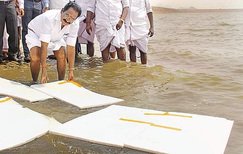 Sellur K Raju with the thermocol sheets to prevent evaporation from Vaigai Dam |  kk sundar