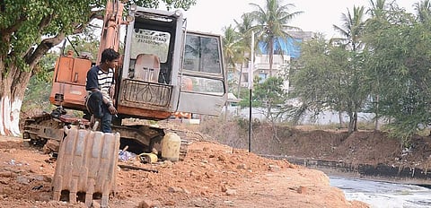 The earth mover that broke down even before the de-weeding work started at Bellandur Lake on Wednesday;  Below: IISc team collect samples from the lake | pushkar v