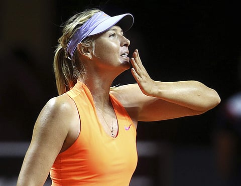 Russia's Maria Sharapova blows a kiss after winning 7-5, 6-3 against Italy's Roberta Vinci at the Porsche Tennis Grand Prix in Stuttgart, Germany, Wednesday, April 26, 2017.  | AP