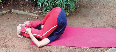 Plow pose to strengthen the back muscles