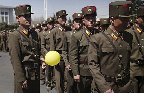 North Korean soldiers walk in the Ryomyong residential area after attending its official opening ceremony on Thursday, April 13, 2017, in Pyongyang, North Korea.  | AP
