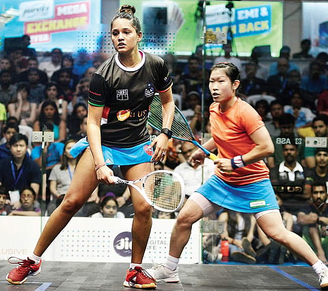 (bottom left) in full flow during their semifinal encounters of the Asian Squash Championships at the Express Avenue mall in Chennai on Saturday | d sampathkumar