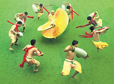 Astad Deboo peforming with his students