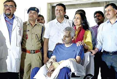 Chetan Cheetah being discharged from AIIMS, where he was admitted  after he was shot at nine times during a fight in Srinagar, in New Delhi  on Wednesday | Express