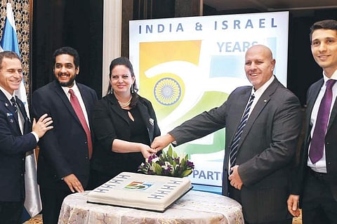 Israeli  Consul General Yael Hashavit (third from left) and Deputy Chief of Mission Ziv Shavi (second from right) with other delegates at the party