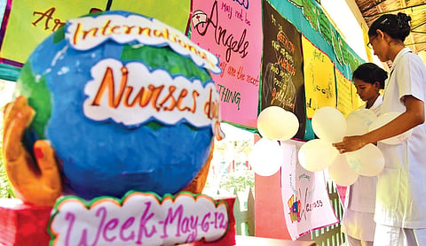 Nursing students decorate the corridors of the General Hospital, Ernakulam, ahead of the International Nurses Day, which falls on Friday | Albin Mathew