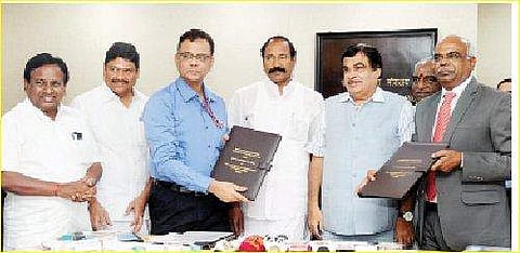 Union Minister Nitin Gadkari (fifth from left) witnessing the signing ceremony of an MoU between V O Chidambarnar Port Trust and Tamil Nadu Generation and Distribution Corporation Limited | PTI