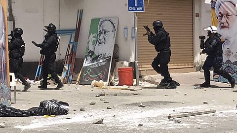 Bahraini security forces during a raid on a sit-in demonstration, in Diraz on May 23, 2017. (Photo | AP)
