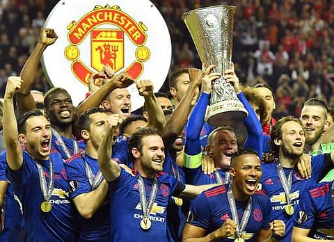 United's Wayne Rooney lifts the trophy after winning the soccer Europa League final between Ajax Amsterdam and Manchester United at the Friends Arena in Stockholm | AP