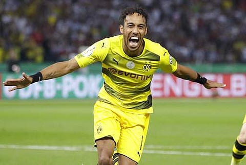 Dortmund's Pierre-Emerick Aubameyang celebrates after scoring his side's 2nd goal during the German soccer cup final match between Borussia Dortmund and Eintracht Frankfurt in Berlin. | AP