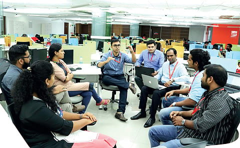Deepu Prakash and Dileep along with the team members of Fingent Sarath P