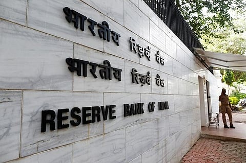 A police officer stands guard in front of the Reserve Bank of India (RBI) head office in Mumbai, India (File | Reuters)
