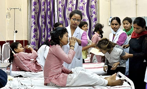 School students being treated at a hospital in New Delhi on Saturday. | PTI