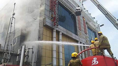 A massive fire broke out at Chennai Silks, a popular multi-level silk saree and clothing store in the crowded shopping hub of T Nagar in Chennai. (D Sampath Kumar | EPS)