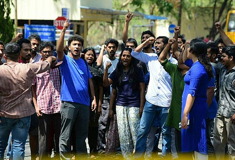 Students protesting at IIT Madras, demanding justice for Sooraj on Thursday. (EPS | Sunish Surendran)