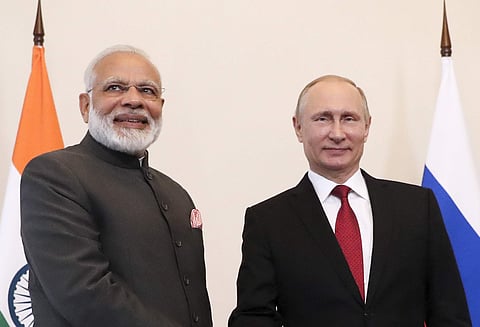 Russian President Vladimir Putin, right, and India's Prime Minister Narendra Modi pose for a photo prior their talks at the St. Petersburg International Economic Forum in St. Petersburg, Russia, Thursday, June 1, 2017.