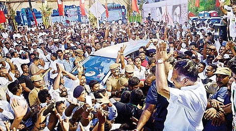 O Pannerselvam greeting his supporters after arriving at the meeting venue in Velappanchavadi on Sunday | Express