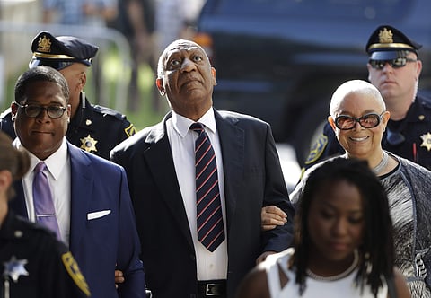 Bill Cosby arrives for his sexual assault trial with his wife Camille Cosby, right, at the Montgomery County Courthouse in Norristown, Pa., on Monday. (Photo | AP)