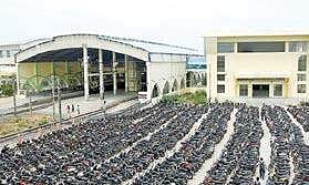 The congested two-wheeler parking area at Velachery railway station | MARTIN  LOUIS