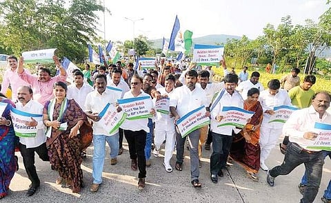 YSRC activists stage a dharna near Vizag airport seeking action against TDP MP  JC Diwakar Reddy who created a ruckus at the airport, on Saturday | Express