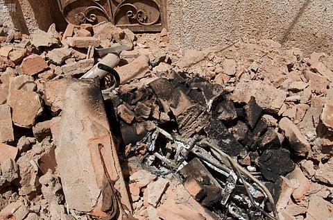 A photo released by Saudi Press Agency, SPA, shows the scene of a suicide bombing after a police raid in Mecca, Saudi Arabia. | AP