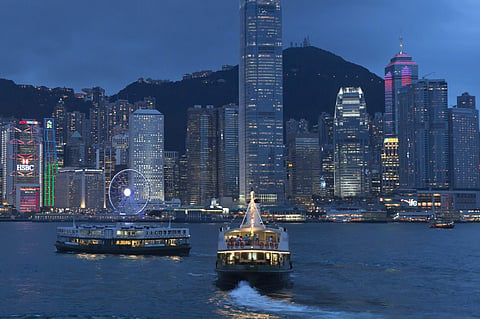 Today as Hong Kong approaches the 20th anniversary of its return to China, it remains a bustling commercial and financial center as well as the location of the main government offices. However, along the streets that angle sharply upward toward the mounta