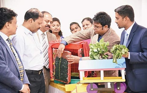 A S Venu (right) explains the project to Chief Secretary Subhash Chandra Khuntia (2nd from left) and FKCCI president M C Dinesh during the Manthan — 2017 event  | Nagaraja Gadekal
