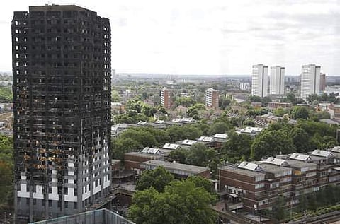 The burnt Grenfell Tower apartment building stands testament to the recent fire in London.(File photo | AP)