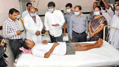 HRD minister Ganta Srinivasa Rao interacts with the anthrax patients at KGH in Visakhapatnam on Tuesday | Express