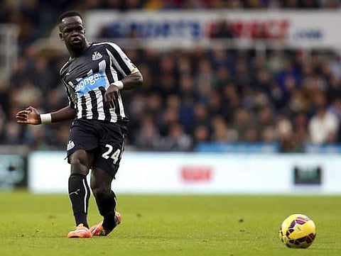 Newcastle United's Cheick Tiote plays the ball forward during their English Premier League soccer match against Chelsea. AP