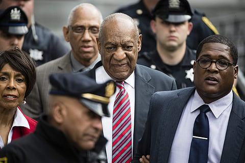Bill Cosby walks from the Montgomery County Courthouse during his sexual assault trial in Norristown. | AP