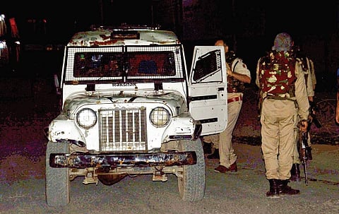 Security personnel stand guard after  militants opened fire on the Amarnath yatris, killing seven pilgrims and injuring dozens of others in Anantnag, Jammu and Kashmir, late on Monday | PTI