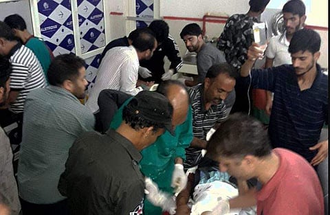 Injured being treated in a hospital after militants opened fire on the Amarnath Yatra in which some pilgrims were killed many injured in Anantnag in Jammu and Kashmir on Monday. | PTI