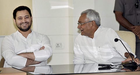 Bihar CM Nitish Kumar (R) with  deputy chief minister Tejashwi Yadav. | File photo by PTI