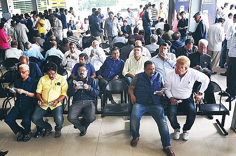 People watch the race closely on a screen, next to the betting counter  Nagesh Polali
