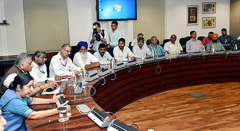 Prime Minister Narendra Modi with NCP chief Sharad Pawar, President of National Conference Farooq Abdullah, CPI's D. Raja, Parliamentary Affairs Ministers Ananth Kumar and MoS Mukhtar Abbas Naqvi after an all-party meeting ahead of monsoon session of Parl